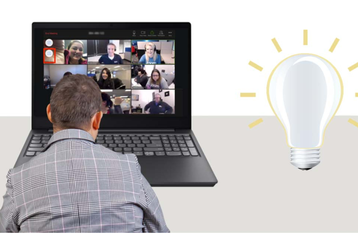 A person sitting at a laptop exchanging ideas with others in an online advisory group