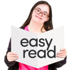 A young woman reads a story in easy read